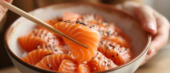 Poster -  A tight shot of a sushi bowl, chopsticks protruding from its rim