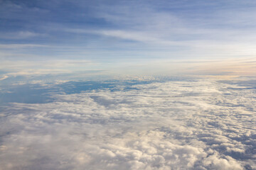 Wall Mural - The sky is filled with clouds and the sun is shining through them