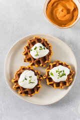 Wall Mural - Vegetarian sweet potato waffles with natural yogurt. Healthy breakfast.