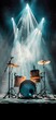 © Mind - Dramatic shot of a drum set on stage with spotlights highlighting the instruments in a smoky, atmospheric concert setting.