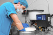 © HealthyShot - Embryologists a Liquid Nitrogen Bank Containing Sperm and Eggs Samples. ivf in vitro fertilization, egg freezing. Sperm cryopreservation. Sperm freezing.