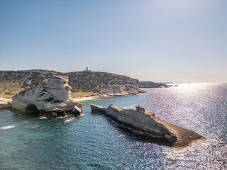 Sticker - Plage de Saint Antoine and lighthouse on the Mediterranean sea at Capo Pertusato near Bonifacio on the south coast of the island of Corsica