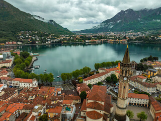 Wall Mural - aerial photo with drone of the city of Lecco on Lago di Como Italy spring