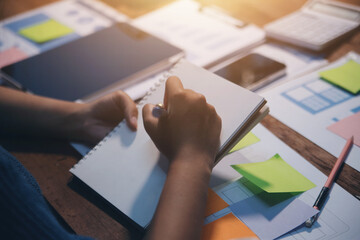 The designer team is designing the uxui system to make the uxui system work well on new phones and support system updates. Website development concept UI UX front end designer