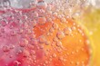 © anatolir - Vibrant and refreshing soda bubbles abstract background with orange and pink colors. Closeup macro detail of fizzy carbonated drink. Translucent texture of effervescence and moisture