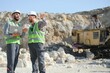 © Serhii - Workers talking in rock quarry