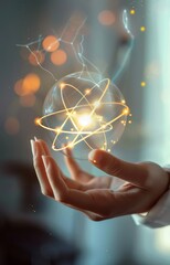 Wall Mural - hand holding glowing atom. physics, science, quantum mechanics, nuclear energy and power concept.