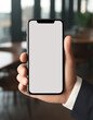 © Enrique - Businessman's hand using a smartphone with a blank screen for copy space