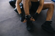 © Queenmoonlite Studio - Boxer Man Preparing Tying Boxing Shoes In Ring Arena Training