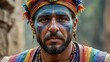 © BOJOShop - Man with Blue Face Paint and Colorful Headband.