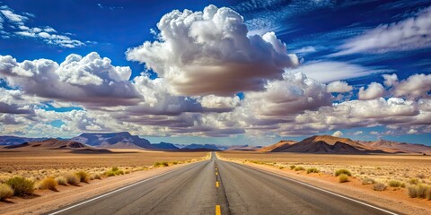 Canvas Print - Paved road cutting through the desert landscape of Namibia with fluffy white clouds above, Namibia, Africa, desert, road, pavement