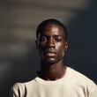 © Nataliia S. - Photoshoot of a stylish black man model in contemporary streetwear and minimalist fashion