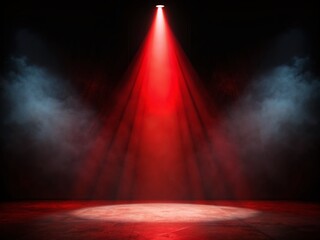 Dark empty black stage illuminated by a single bold red spotlight casting a dramatic glow, creating a sense of anticipation and mysterious atmosphere.