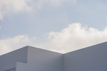 Wall Mural - architecture and landscape concept with white building with clear sky background