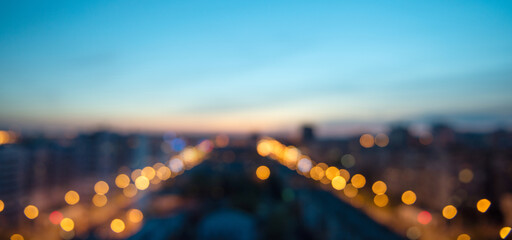 Wall Mural - Cityscape bokeh, Blurred Photo, cityscape at twilight time. Blurred abstract city light background.