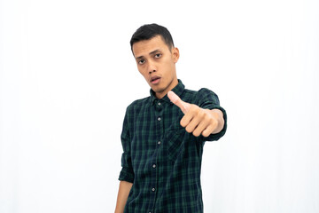 Asian man wearing a green checkered casual shirt stressed showing thumbs up that agree, okay, top. Isolated white background.