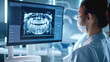 © OMD - Dentist wearing a mask examining a dental X-ray on a computer screen in a modern dental clinic.
