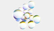 © Westend61 - 3D rendering of colored bubbles with light effect