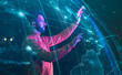 © Westend61 - Confident businessman operating global data in metaverse