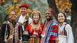 © Lakkhana - People from different cultures wearing traditional clothing, standing together and smiling in a park setting