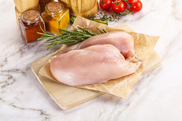 Wall Mural - Raw chicken breast served rosemary