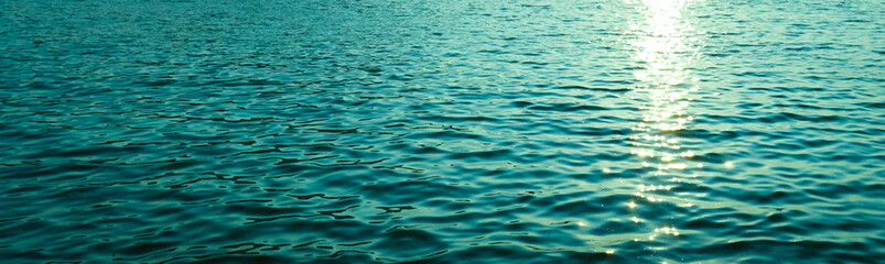 Wall Mural - blue sea water surface texture background with ripples