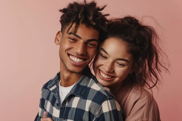 Wall Mural - Portrait of a content mixed race couple in their 20s wearing a comfy flannel shirt on pastel or soft colors background