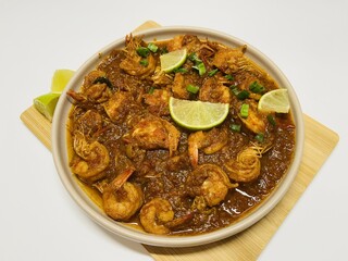 Udang bumbu balado. Shrimp with spicy chili sauce. Traditional cuisine from West Sumatra, Indonesia. Perfect for recipe, article, catalogue, or any cooking contents.