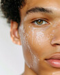 © SOLDATOOFF - A young mixed-race man with facial foam, highlighting his clean and clear skin