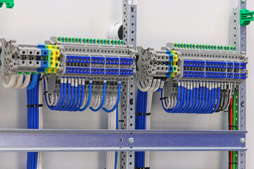 Sticker - Electrical terminals with connected copper wires with metal tips.