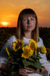 © Олег Мальшаков - Beautiful young girl in a white dress in sunflowers