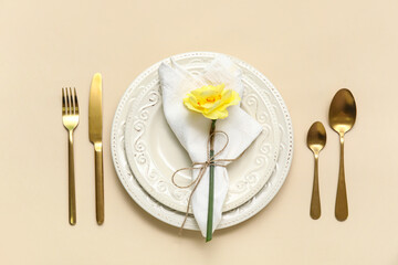 Wall Mural - Stylish table setting with beautiful flower on beige background