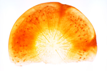 Wall Mural - Macro shot of carrot sliced texture on white background