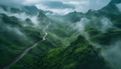 Wall Mural - Aerial View of Winding Road Through Misty Mountains in Vietnam