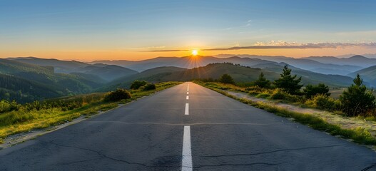 Canvas Print - Asphalt Road Through Mountain Landscape at Sunset