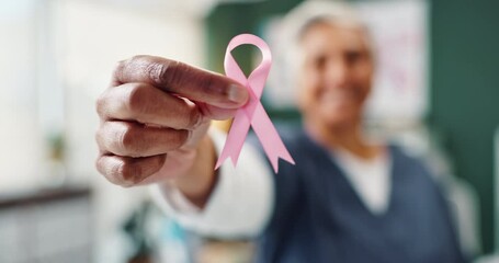 Canvas Print - Ribbon, hand and breast cancer awareness for healthcare, support and empathy with nurse in office. Community, medical care and examination for prevention, treatment and female person advocate