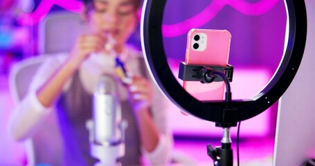 Sticker - Makeup, girl and ring light for live streaming, beauty tutorial and review with online followers in neon bedroom. Influencer or content creator with phone and mascara, product or sponsorship at home