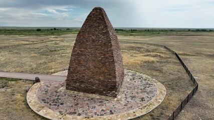 Canvas Print - The four-sided mazar Kozy Korpesh and Bayan Sulu Mausoleum (VIII-X centuries) is built of flat stone, the building narrows upwards, forming a rounded top. East Kazakhstan region.