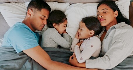 Sticker - Rest, parents and children sleeping in bed for nap, dreaming or relax together in bedroom, Top view, family man and tired woman with girl kids in home for support, embrace or comfortable on weekend