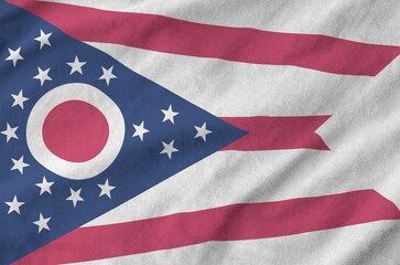 Canvas Print - Ohio US state flag depicted on folded wavy fabric of old cloth close up