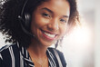 © peopleimages.com - Portrait, telemarketing and black woman with call center, headphones and customer service. Friendly agent, insurance consultant and employee with headset, tech support and contact us with help desk