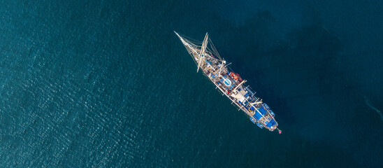 Sticker - Aerial view of beautiful sailboat yacht boat on the sea, Luxury yacht ship boat in the open sea, Sailing ship yacht.