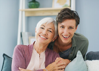 Wall Mural - Senior woman, daughter and smile in home with hug for family, love and support for retirement. Female people, happiness and together in house with care or kindness, mom with child or portrait