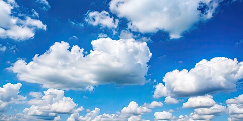 Canvas Print - Beautiful fluffy white clouds in a vibrant blue sky , nature, sky, background, cloudscape, weather, atmospheric, peaceful