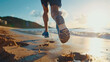 © wiparat - woman running on beach in morning sunrise