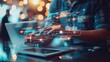 © Nathan - Person using laptop with futuristic data interface overlay