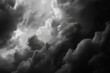 © Iftikhar alam - A black and white depiction of dark, brooding rain clouds looming overhead, Dark, brooding rain clouds looming overhead