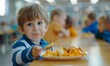 © simba kim - Young boy preschooler sitting in the school cafeteria eating lunch, Generative AI