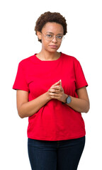 Sticker - Beautiful young african american woman wearing glasses over isolated background Hands together and fingers crossed smiling relaxed and cheerful. Success and optimistic