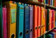 © Tahir - folders on shelf